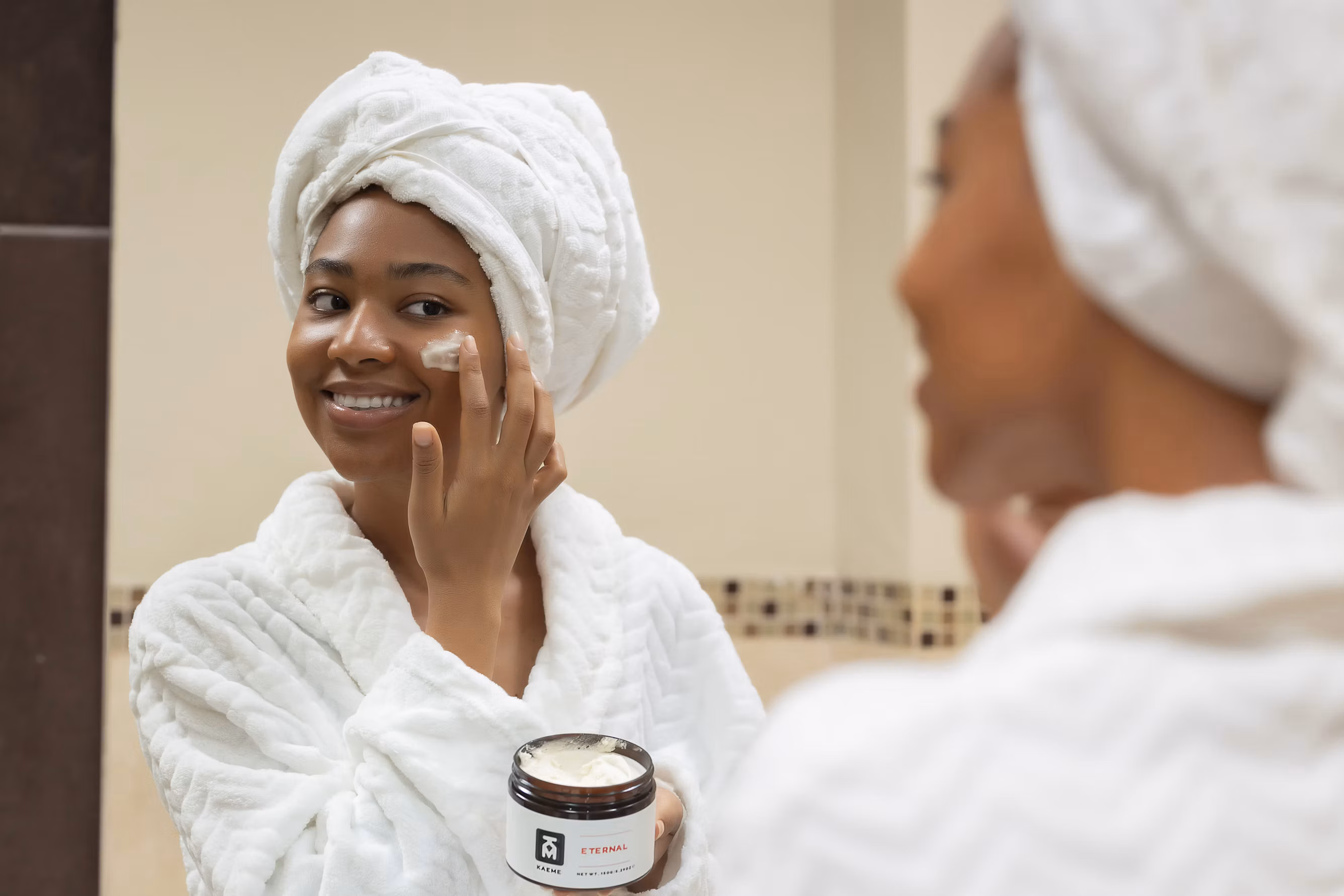 Woman applying skincare